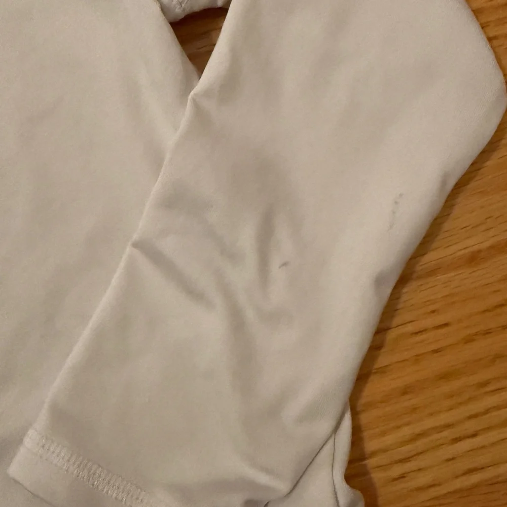 White Rash Guard and Blue Tie-Dye Swim Shorts